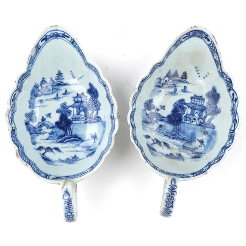 206 - A near pair of Chinese blue and white porcelain sauceboats, 18th century, each decorated with landsc... 