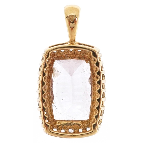 3168 - A 9ct gold amethyst and clear stone pendant, 2.5cm high, 3.9g.