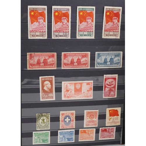 2228 - A brown stamp album containing Chinese stamps including junks, Chairman Mao and Mao Tse Tung togethe... 