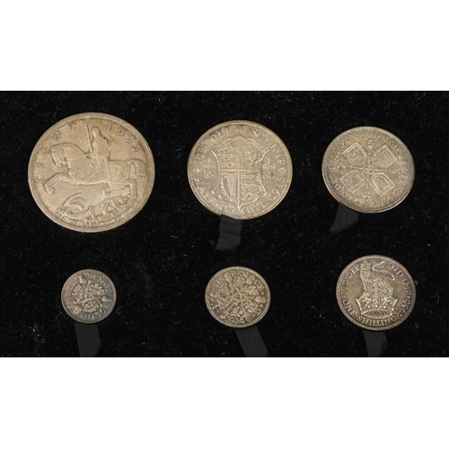 2172 - A George V silver Rocking Horse crown, five 1936 uncirculated half crowns, florin, shilling, sixpenc... 