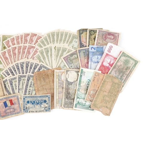 2215 - A quantity of vintage world banknotes to include Japanese Occupational Governmental banknotes of Mal... 