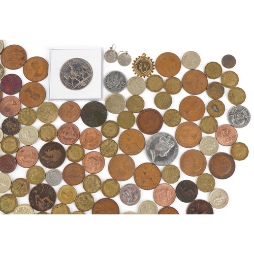 2214 - Vintage British coinage to include brass threepenny pieces, pennies, halfpennies,  thirty eight poun... 