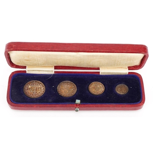 2173 - A George V silver maundy set comprising four coins dated 1923, housed in original presentation box, ... 