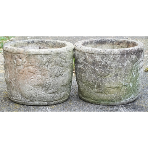 2167 - Two similar 20th century cast composition circular planters, 31cm high x 39cm in diameter.