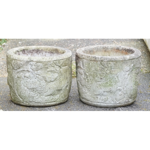 2167 - Two similar 20th century cast composition circular planters, 31cm high x 39cm in diameter.