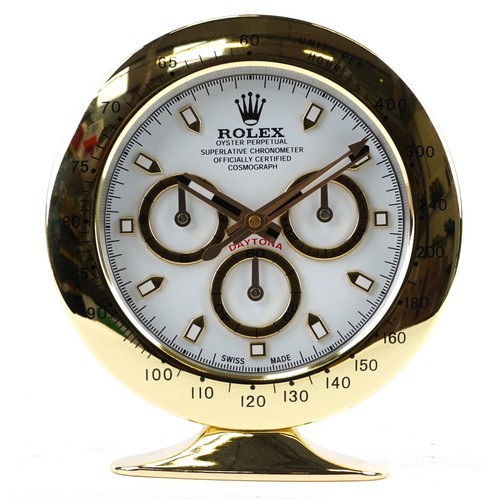 1220 - A Rolex Daytona dealer's display desk clock, 28cm high.