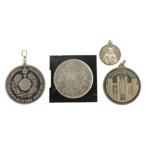 2187 - Silver and white metal coins and medallions to include an Victorian 1845 crown.