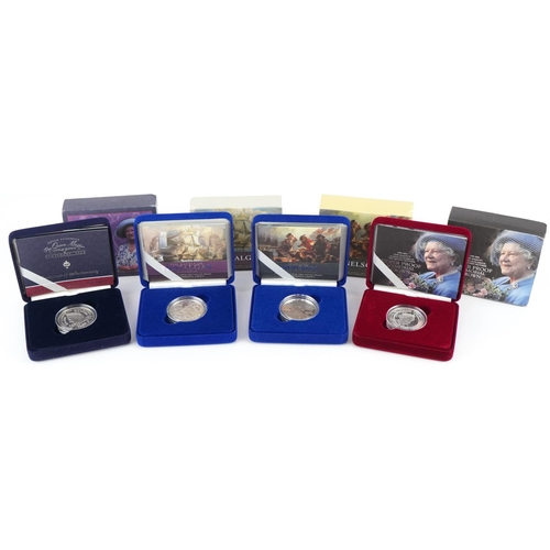 2209 - Four commemorative silver proof crowns to include Queen Mother, Horatio Nelson and The Battle of Tra... 