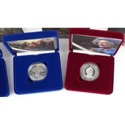 2209 - Four commemorative silver proof crowns to include Queen Mother, Horatio Nelson and The Battle of Tra... 