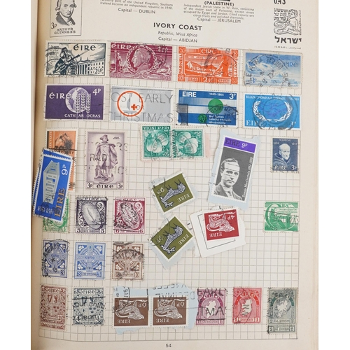 2220A - Two blue stamp albums containing 19th century and later British and world stamps.