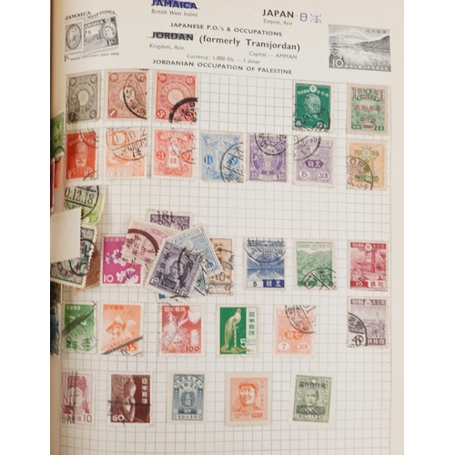 2220A - Two blue stamp albums containing 19th century and later British and world stamps.