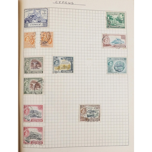 2220A - Two blue stamp albums containing 19th century and later British and world stamps.