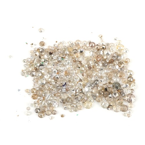 3171 - A large collection of loose diamonds, white sapphires and clear stone solitaires, the largest approx... 