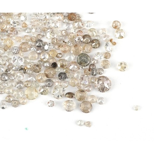 3171 - A large collection of loose diamonds, white sapphires and clear stone solitaires, the largest approx... 