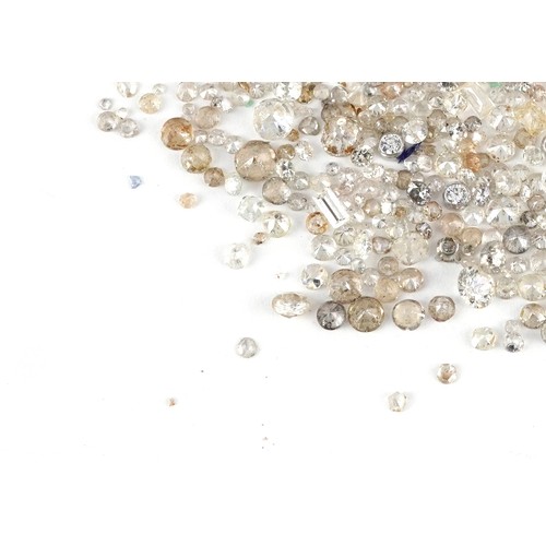 3171 - A large collection of loose diamonds, white sapphires and clear stone solitaires, the largest approx... 