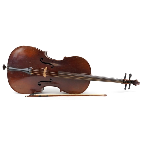 After Antonius Stradivarius, cello with bow and case, paper label to the interior, the back 30.5 inches in length including button.