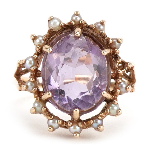 3221 - A 9ct gold amethyst and seed pearl ring, size M, 4.4g.