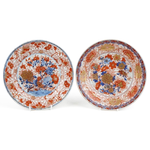 Two similar Chinese porcelain clobbered circular plates, 18th century, each 23cm in diameter