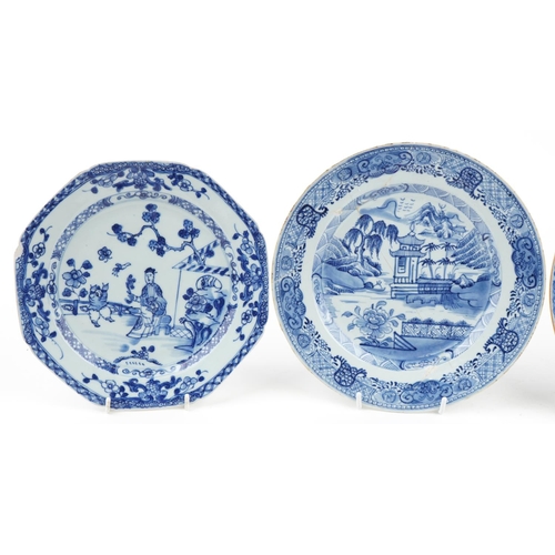 250 - A group of four Chinese blue and white porcelain circular plates, 18th century, with hand painted de... 