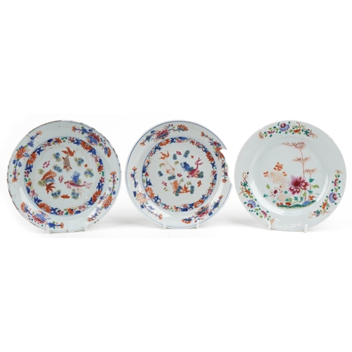 470 - A group of three Chinese porcelain plates, 18th century, with hand painted decoration, 23cm in diame... 