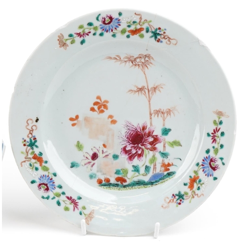 470 - A group of three Chinese porcelain plates, 18th century, with hand painted decoration, 23cm in diame... 