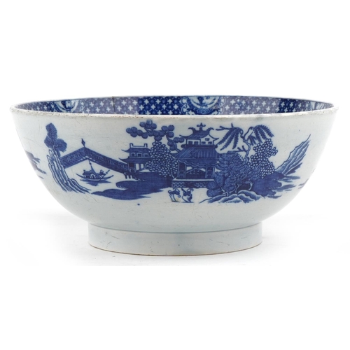 117 - A 19th century English porcelain blue and white transfer printed Willow pattern bowl, 24cm in diamet... 