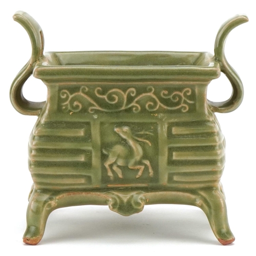 220 - A Chinese porcelain celadon glazed incense burner with twin handles, 16cm high x 18cm wide.