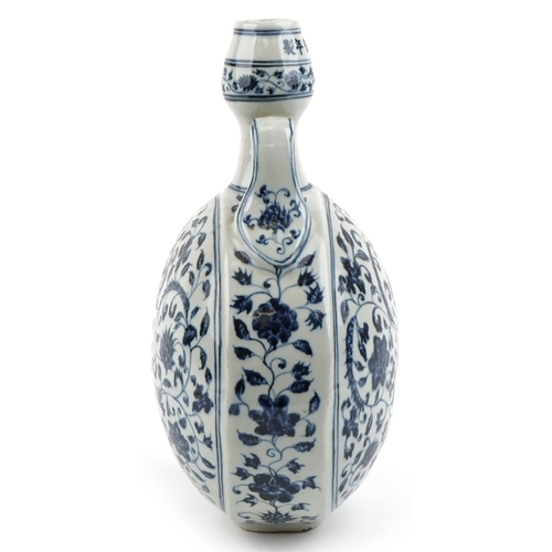 150 - A Chinese porcelain blue and white twin handled moon flask hand painted with foliage and vines, 32cm... 