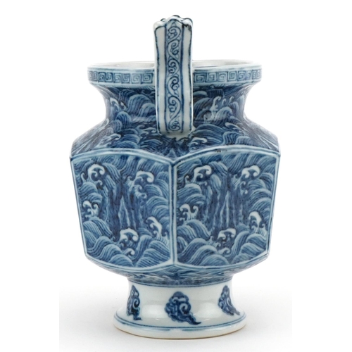 182 - A Chinese porcelain blue and white hexagonal vase with twin handles, six figure character mark to th... 