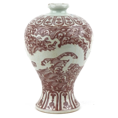 494 - A large Chinese porcelain baluster vase hand painted in iron red onto a cream ground with a dragon c... 