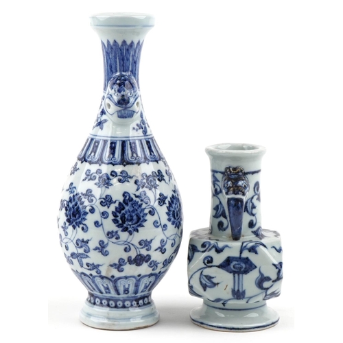 467 - Two Chinese porcelain blue and white vases with animalia head handles, the smaller with six figure c... 