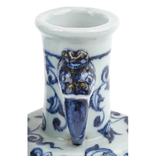 467 - Two Chinese porcelain blue and white vases with animalia head handles, the smaller with six figure c... 