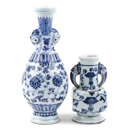 467 - Two Chinese porcelain blue and white vases with animalia head handles, the smaller with six figure c... 