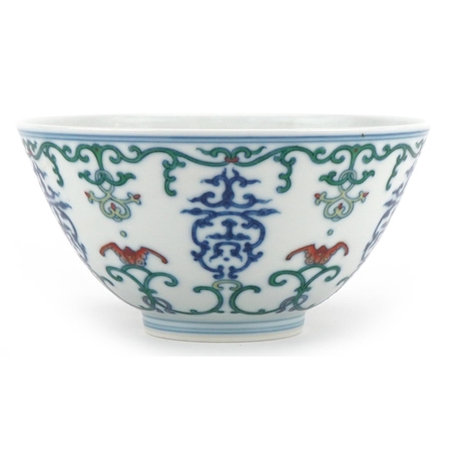 313 - A 20th century Chinese porcelain footed bowl hand painted with bats and stylized motifs, character m... 