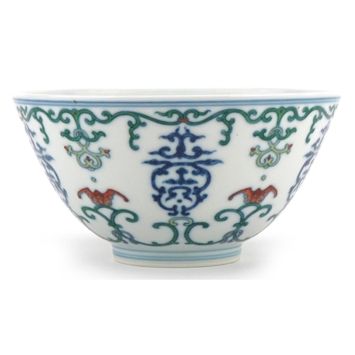 313 - A 20th century Chinese porcelain footed bowl hand painted with bats and stylized motifs, character m... 