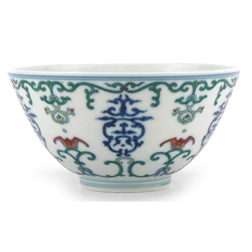 313 - A 20th century Chinese porcelain footed bowl hand painted with bats and stylized motifs, character m... 