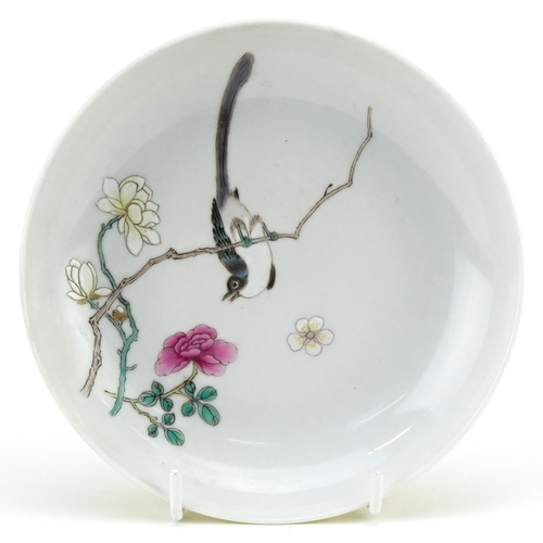 188 - A Chinese porcelain shallow dish hand painted with a bird on a branch, paper label to the base, 15.5... 