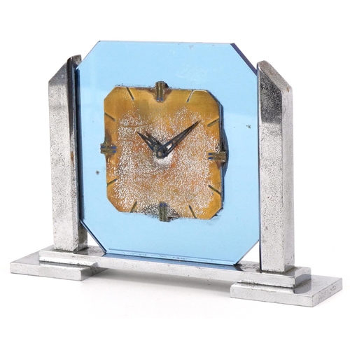 205 - An Art Deco chrome and blue glass mantle clock numbered 981 1799 956131 to the base, 14cm wide.