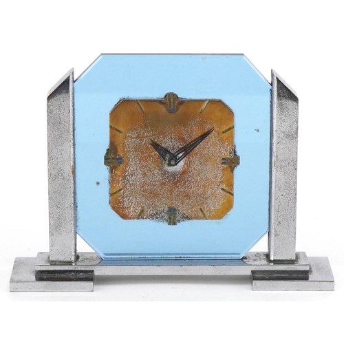 205 - An Art Deco chrome and blue glass mantle clock numbered 981 1799 956131 to the base, 14cm wide.