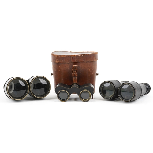 Three pairs of vintage binoculars, one with tan leather case, including J E Steward.