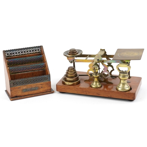 1589 - A set of Victorian brass post scales by S Mordan & Co. and an Edwardian open brass letter rack, the ... 