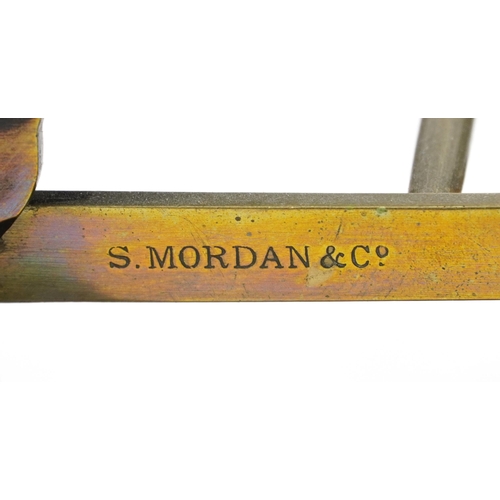 1589 - A set of Victorian brass post scales by S Mordan & Co. and an Edwardian open brass letter rack, the ... 