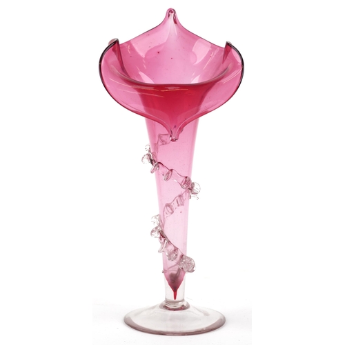 260 - A Victorian cranberry glass tulip vase with trailed decoration, 27cm high.