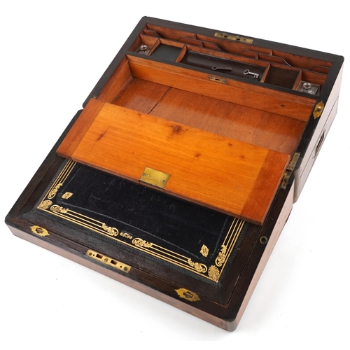  A 19th century figured walnut writing slope with fitted interior and brass fittings, 45cm wide.