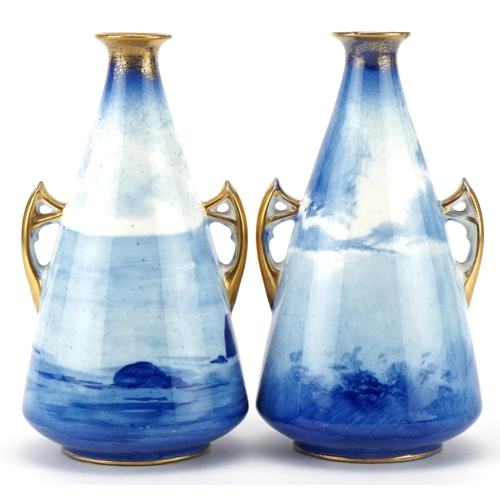 53 - A pair of Royal Doulton Blue Children series ware conical vases with twin handles, 17cm high.