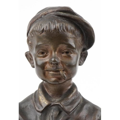  José Cardona patinated bronze study of a young boy with a basket, 31.5cm high.