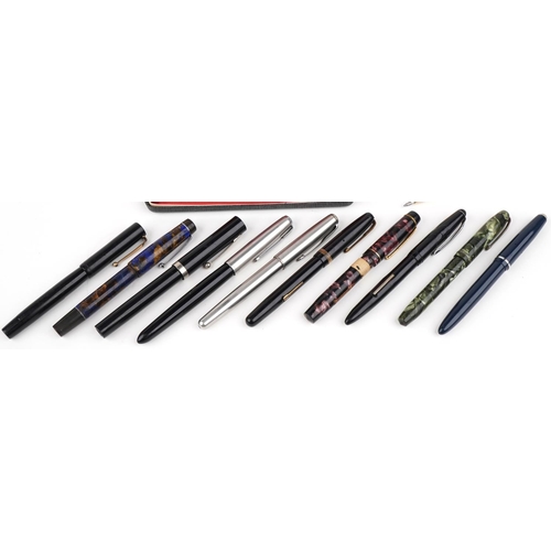 308 - Vintage and later fountain pens and ballpoint pens, some with gold nibs, including Parker, Conway St... 