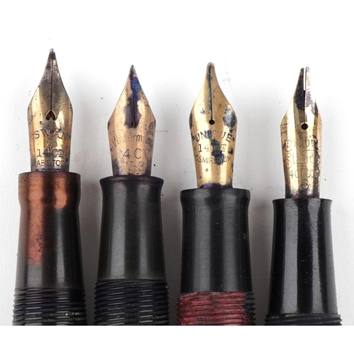 308 - Vintage and later fountain pens and ballpoint pens, some with gold nibs, including Parker, Conway St... 