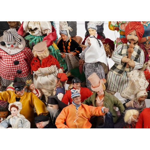 1161 - A large collection of 20th century dolls and puppets, various makers and designs, variously sized.