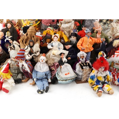 1161 - A large collection of 20th century dolls and puppets, various makers and designs, variously sized.